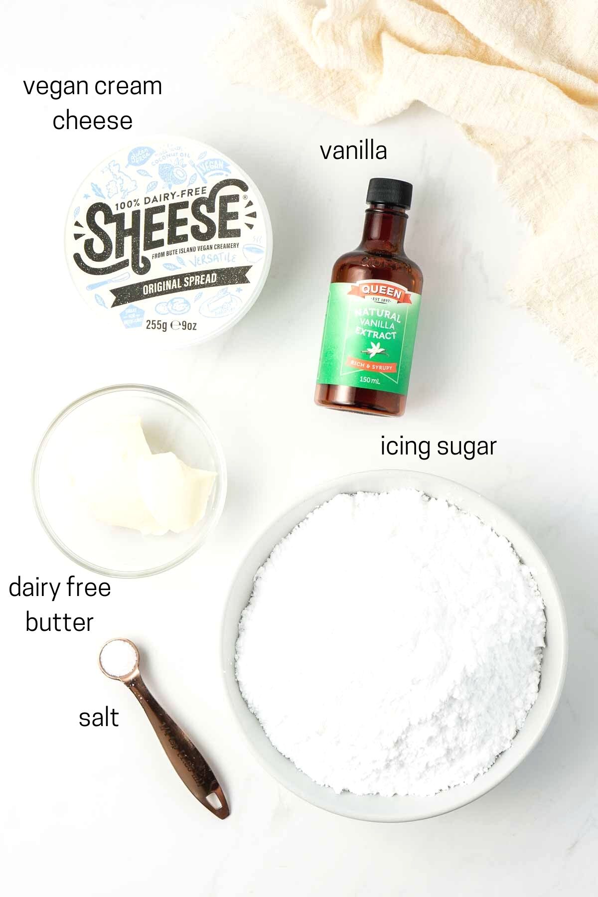 All ingredients needed for vegan cream cheese frosting laid out.