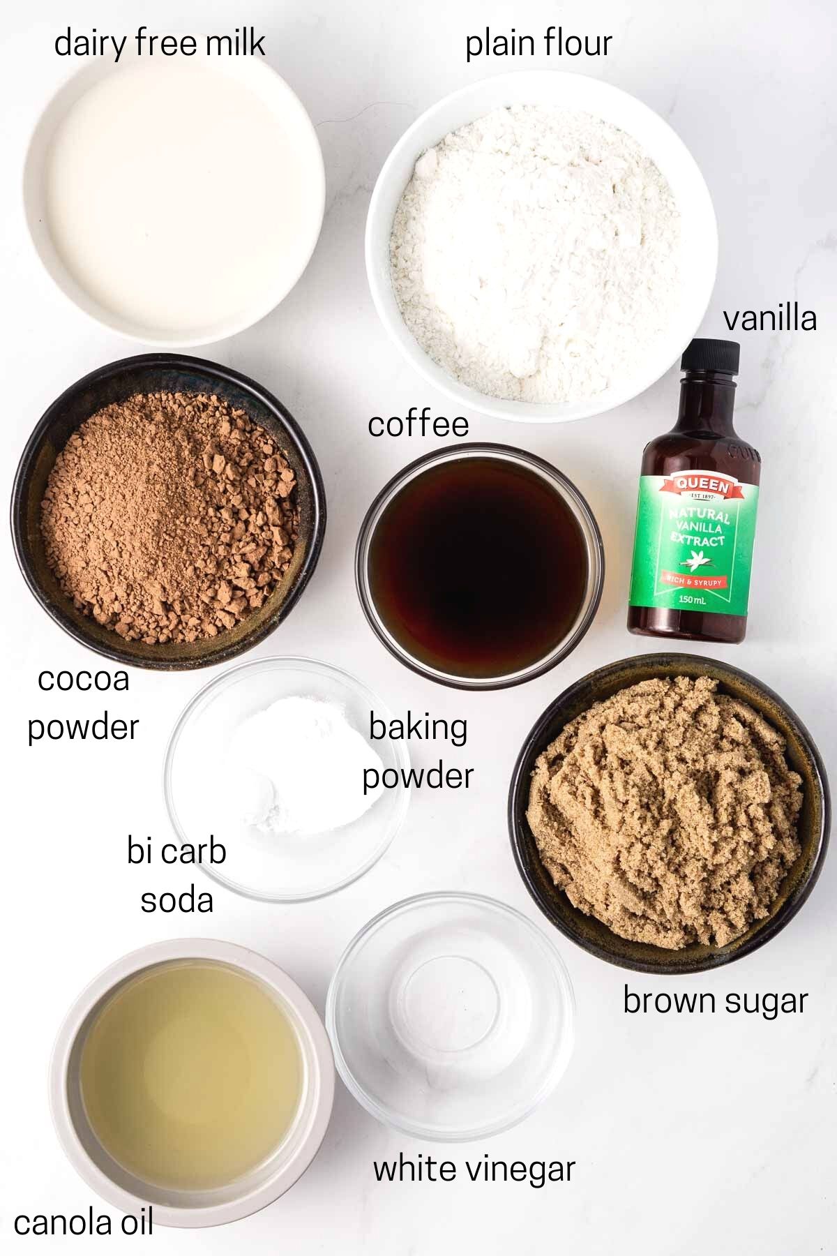 All ingredients needed for dairy free chocolate cake laid out.
