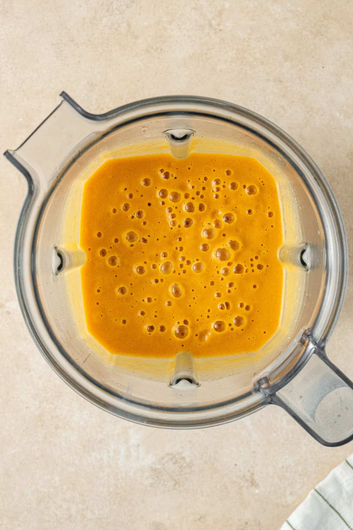 The sweet potato cheese sauce in a blender.