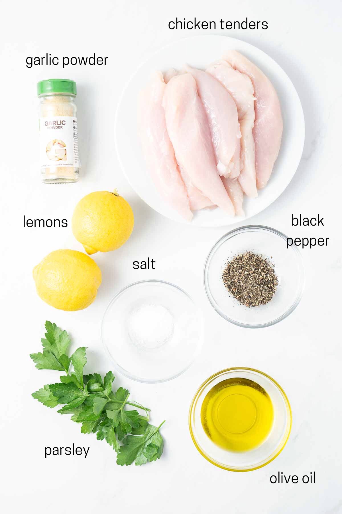All ingredients needed for lemon pepper chicken laid out in bowls.