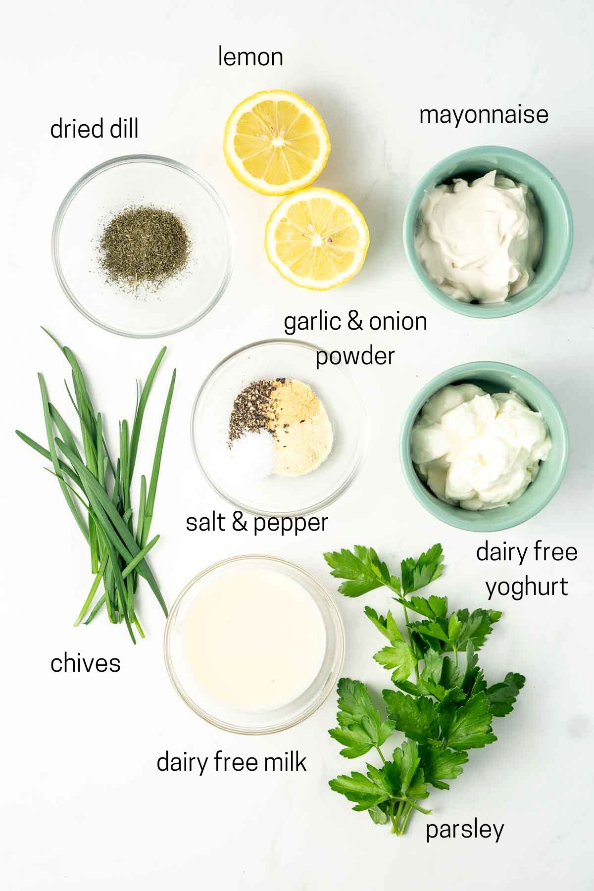 All ingredients needed for dairy free ranch laid out in small bowls.
