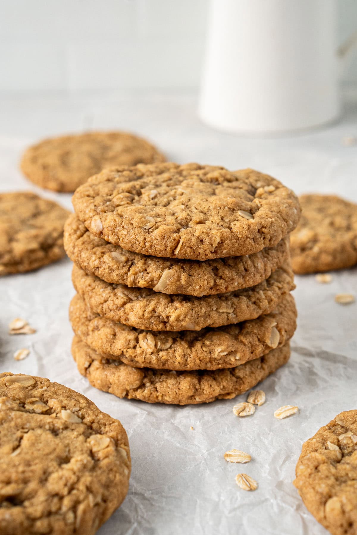 A stack of five dairy free ANZAC biscuits.
