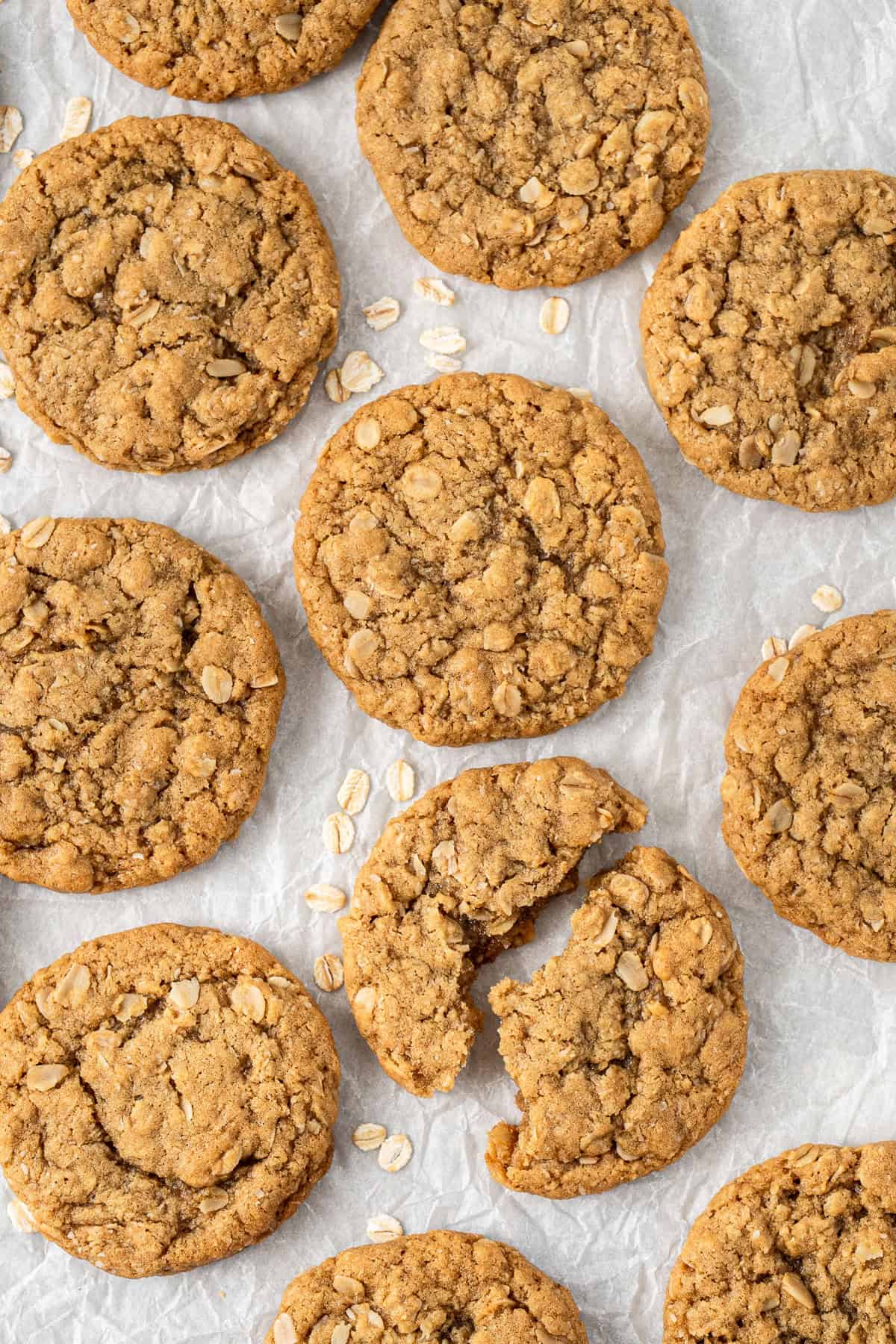 The cooked ANZAC biscuits, one broken in half.