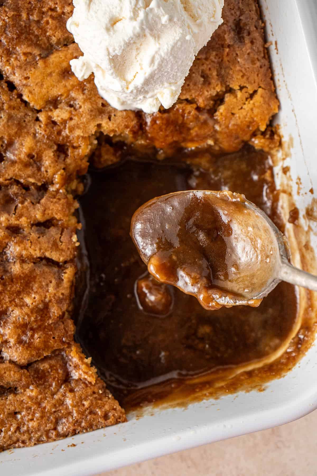 Close up of a spoon showing the delicious butterscotch sauce.