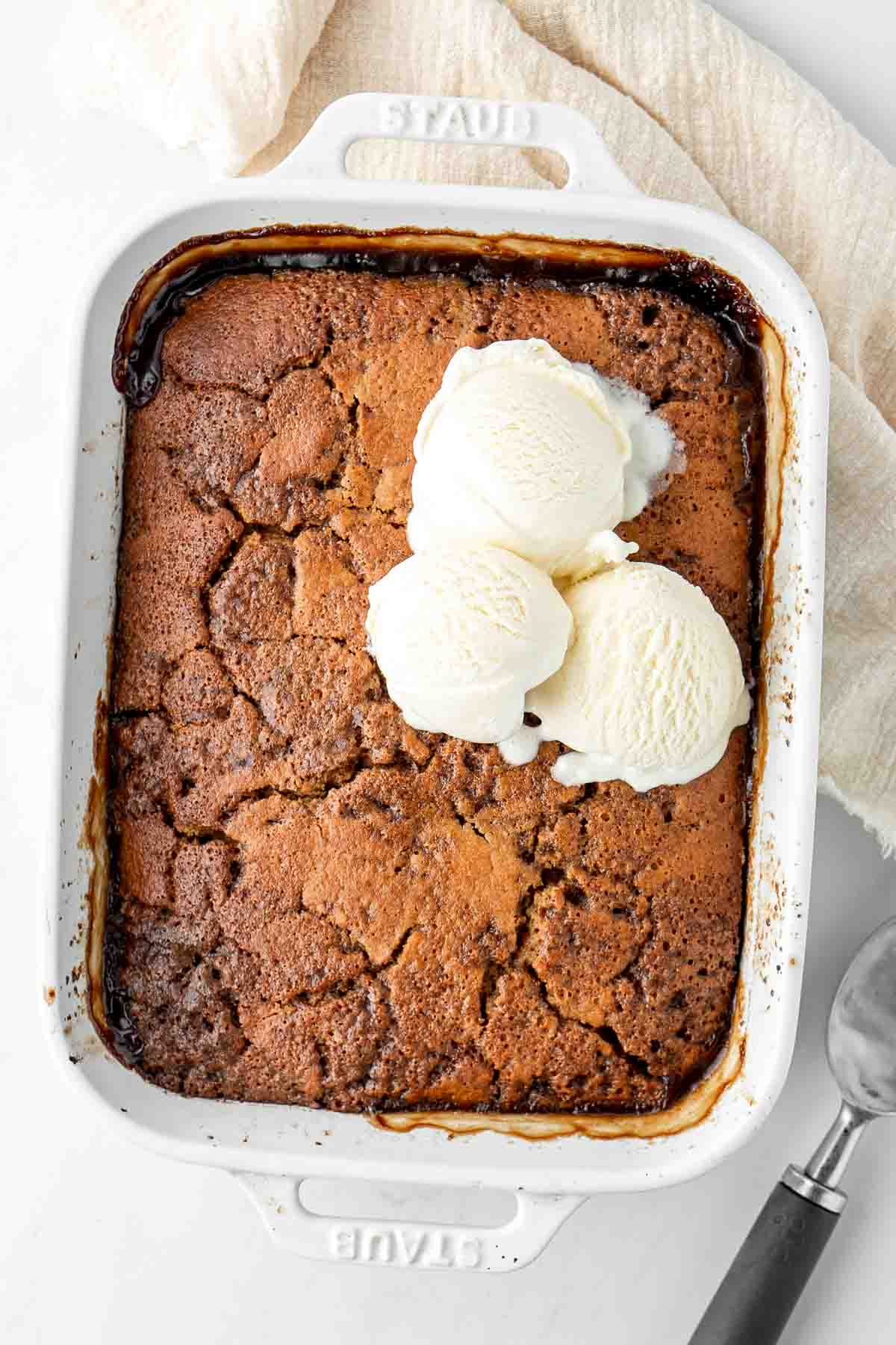 Freshly baked butterscotch pudding from the oven with ice cream.