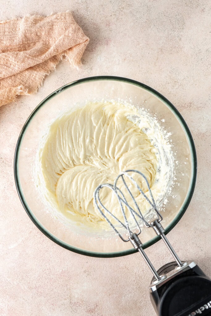 Mixing together the wet ingredients in a bowl.