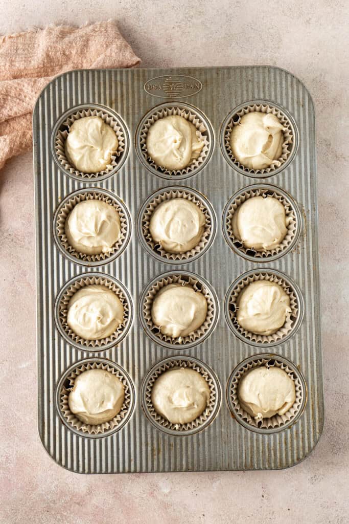 Cupcake batter in the muffin tin.