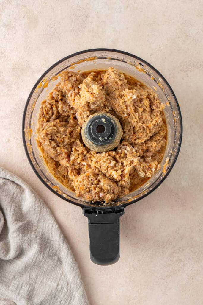 The sausage filling in a food processor. 