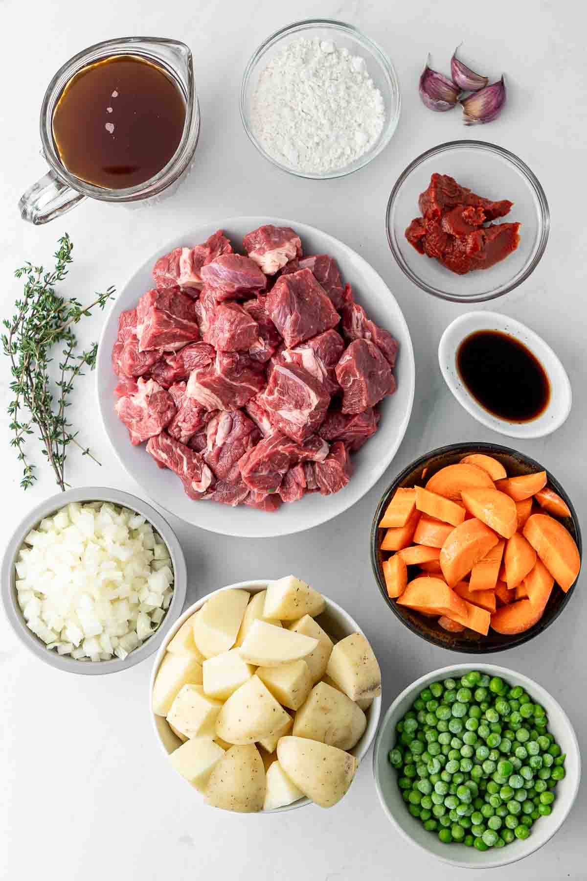All ingredients needed for beef stew laid out.