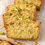 Lemon pistachio cardamon loaf cake sliced.