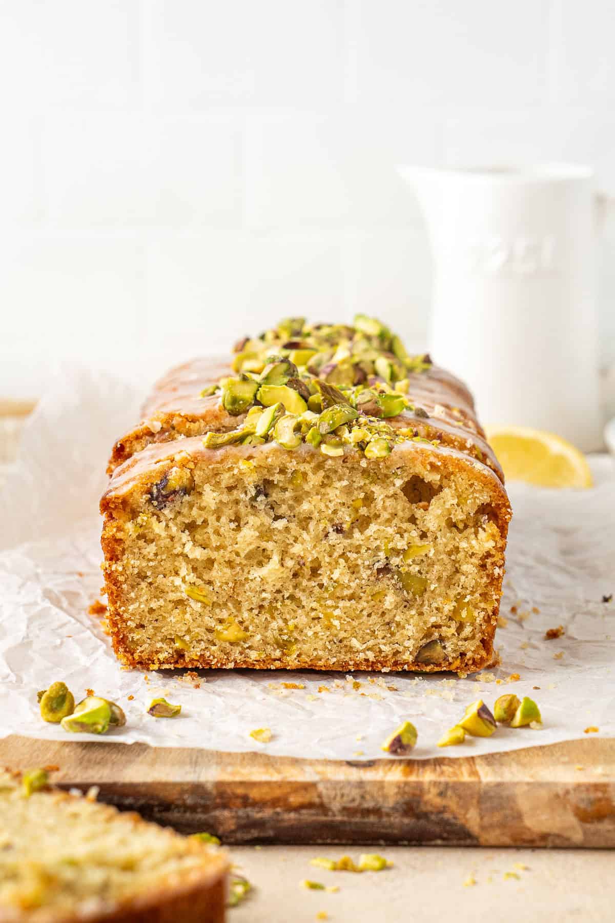The pistachio lemon loaf cake sliced.