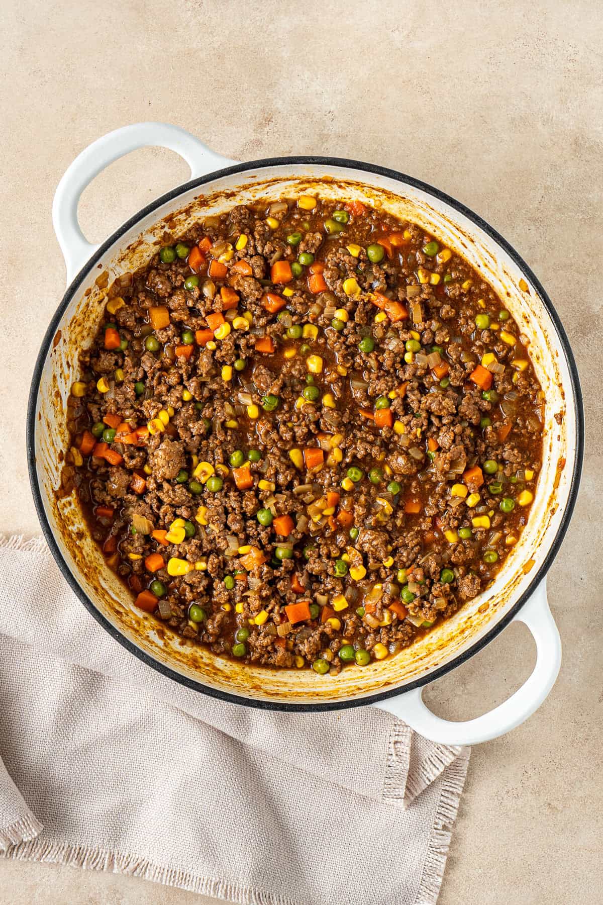 Savoury mince cooked in a cast iron pan.