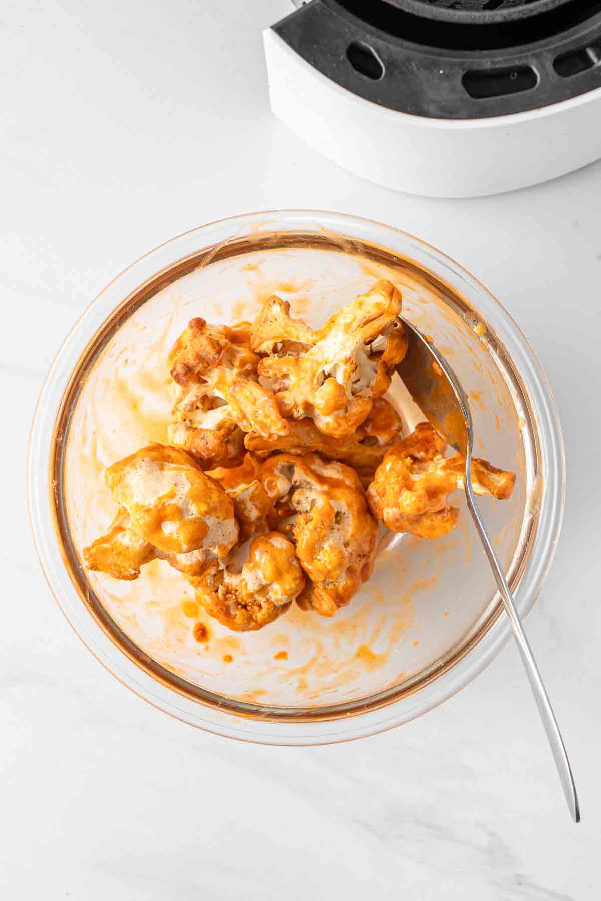 Cooked cauliflower tossed in buffalo sauce. 