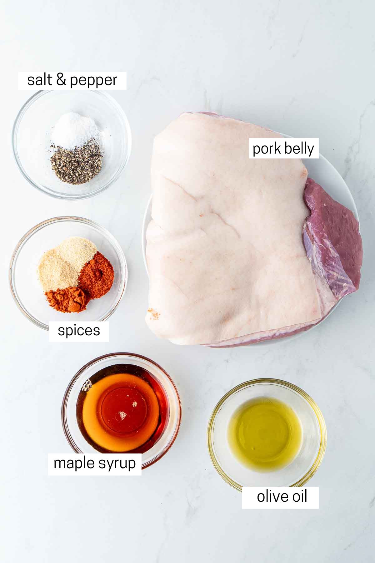 All ingredients needed for pork belly bites laid out in bowls.