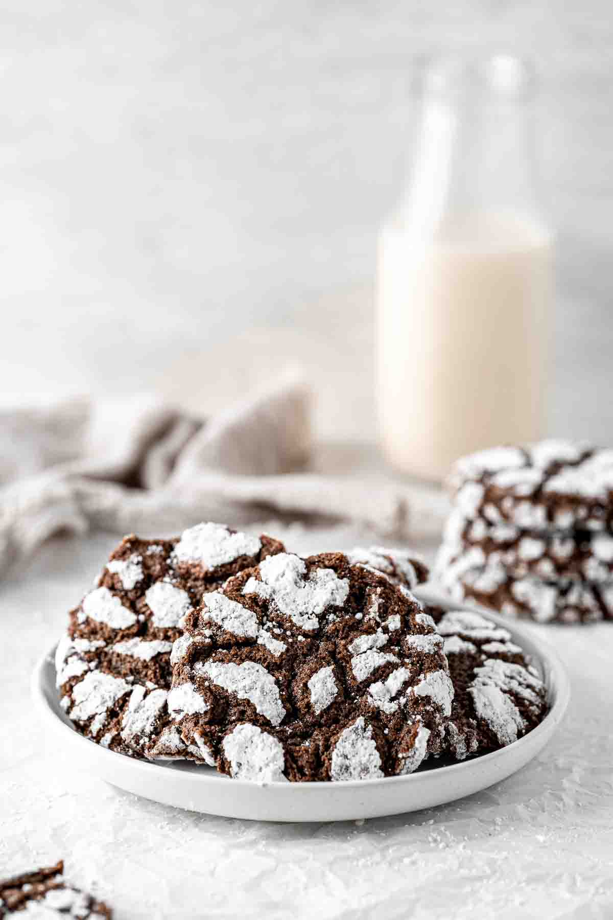 Chocolate crinkle cookies on a plate. 