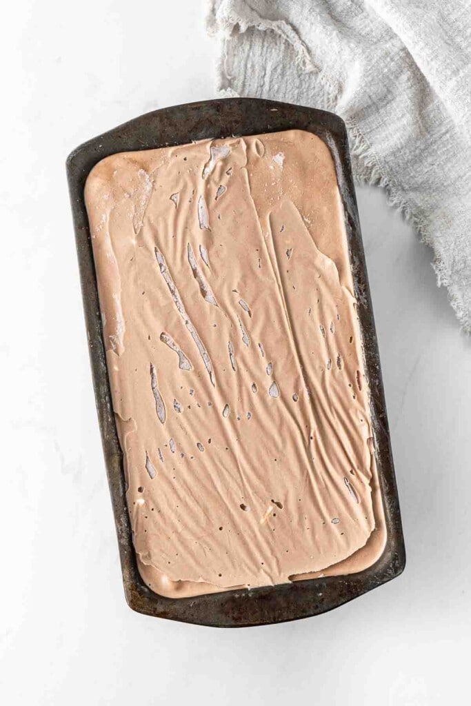 Ice cream frozen in the loaf pan ready to serve.