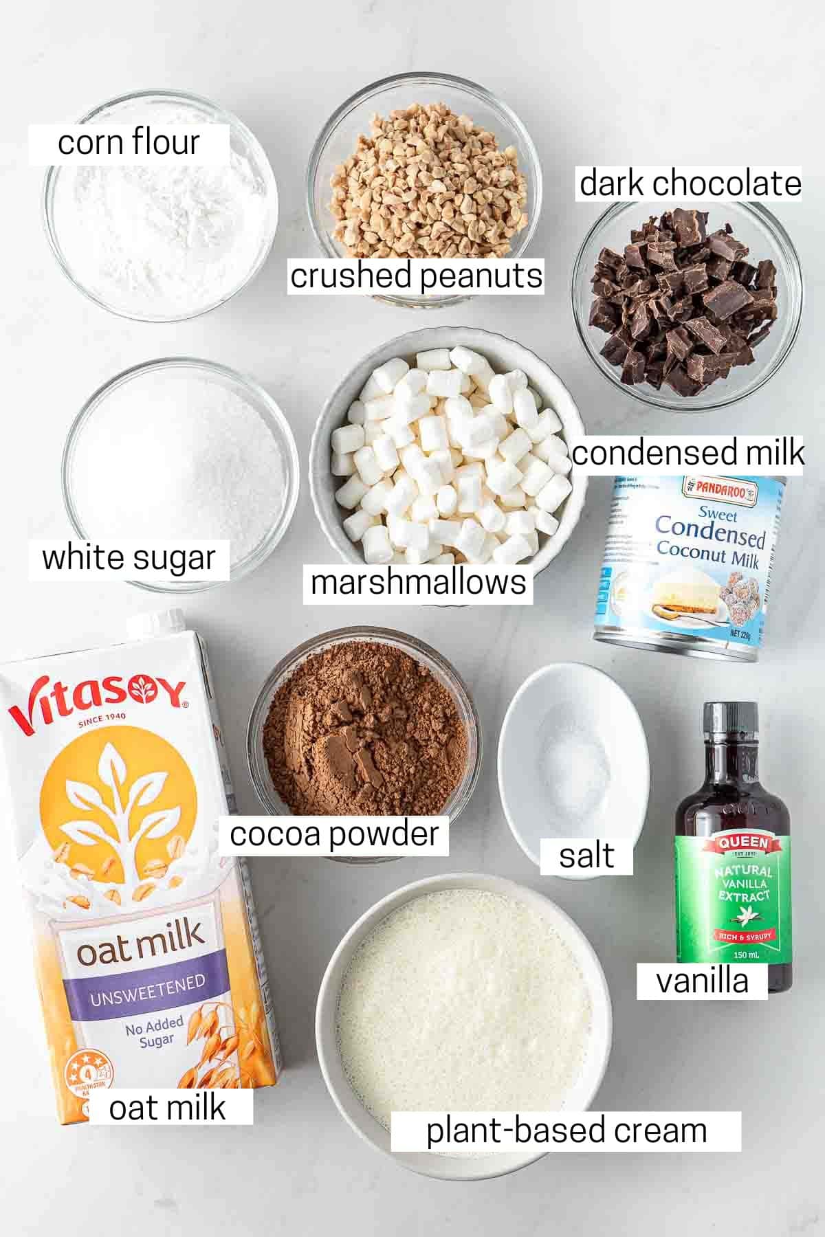 All ingredients needed for dairy free rocky road ice cream laid out in small bowls.