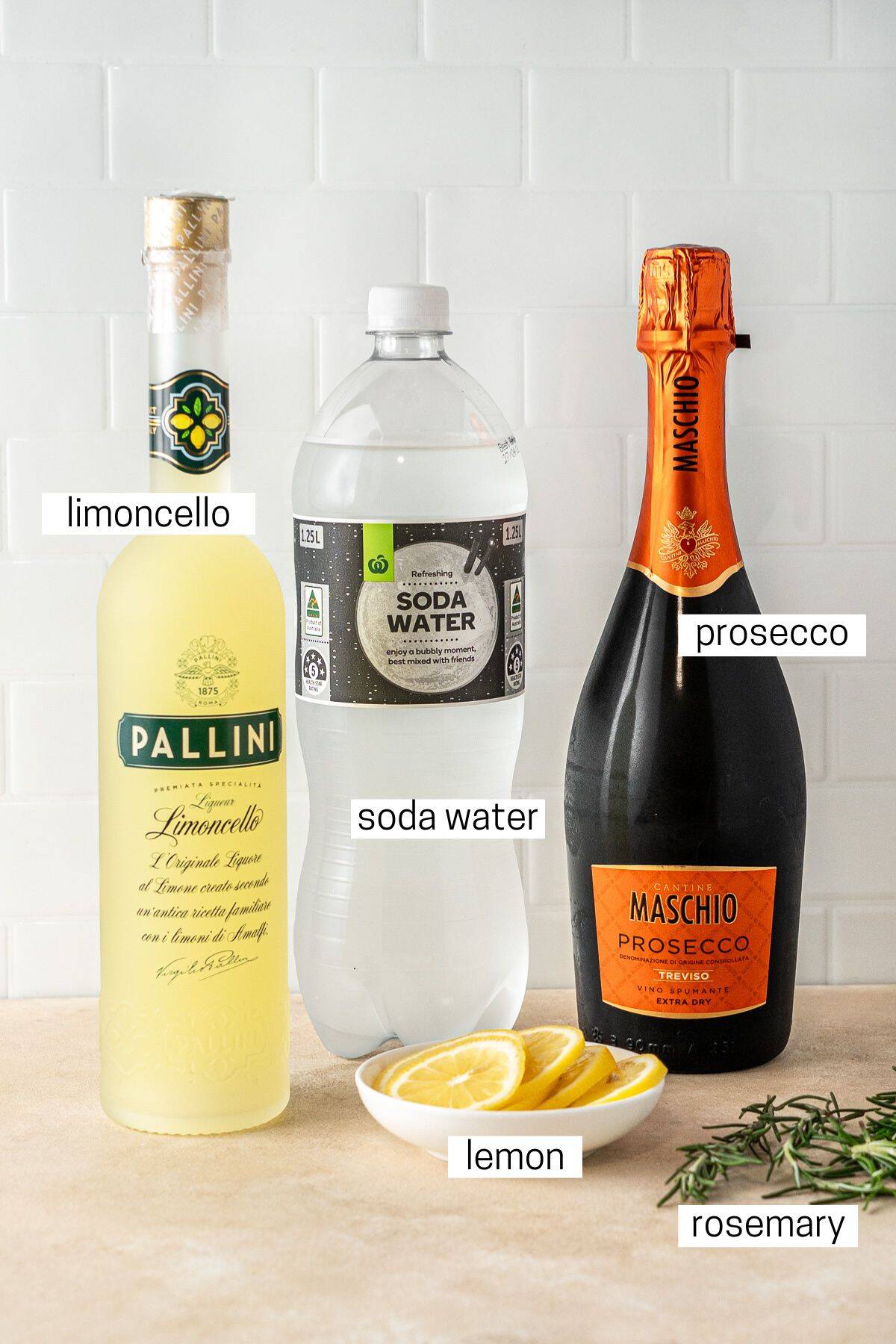 All ingredients needed to make a limoncello spritz.