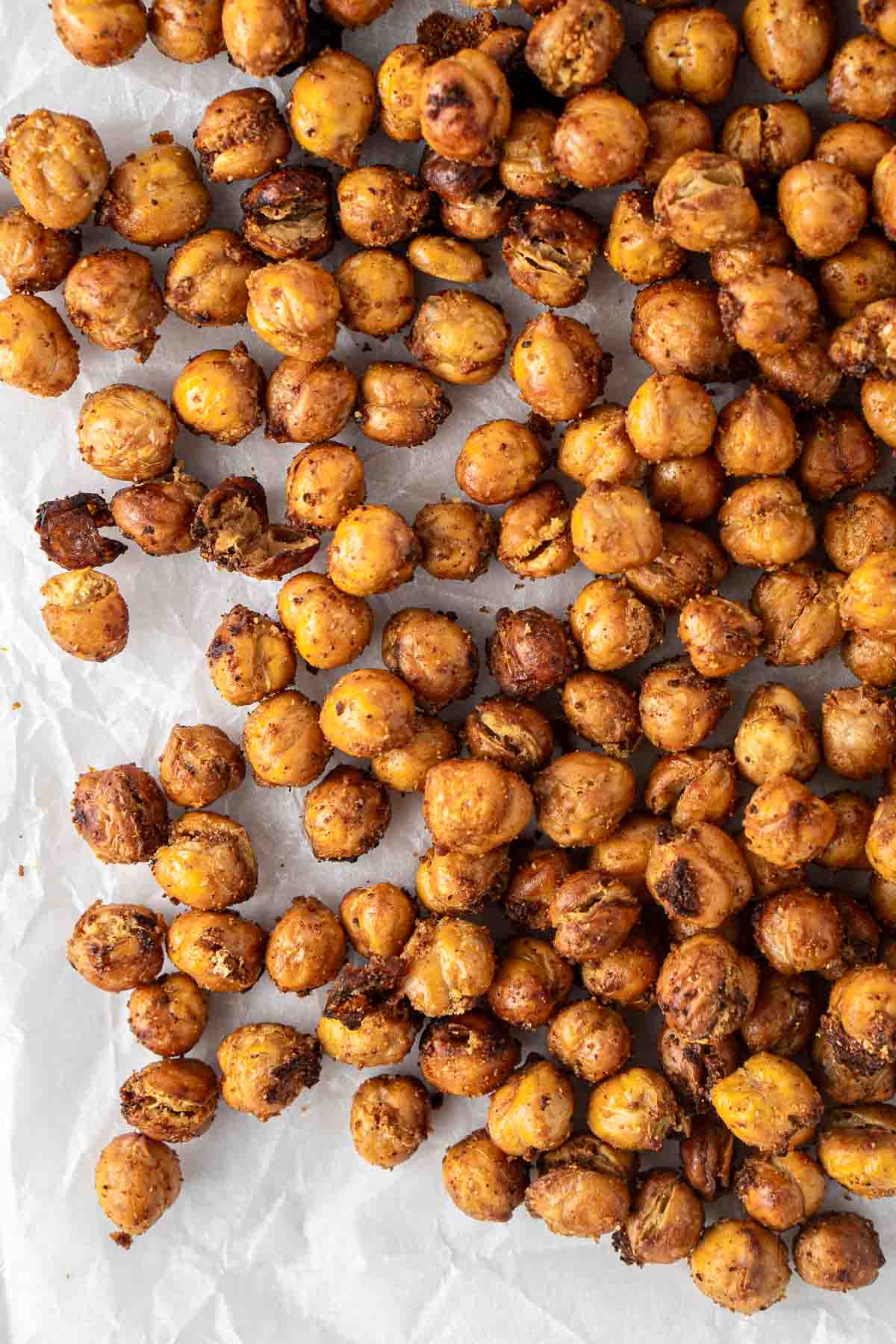 Close up of spiced crispy chickpeas on a tray. 