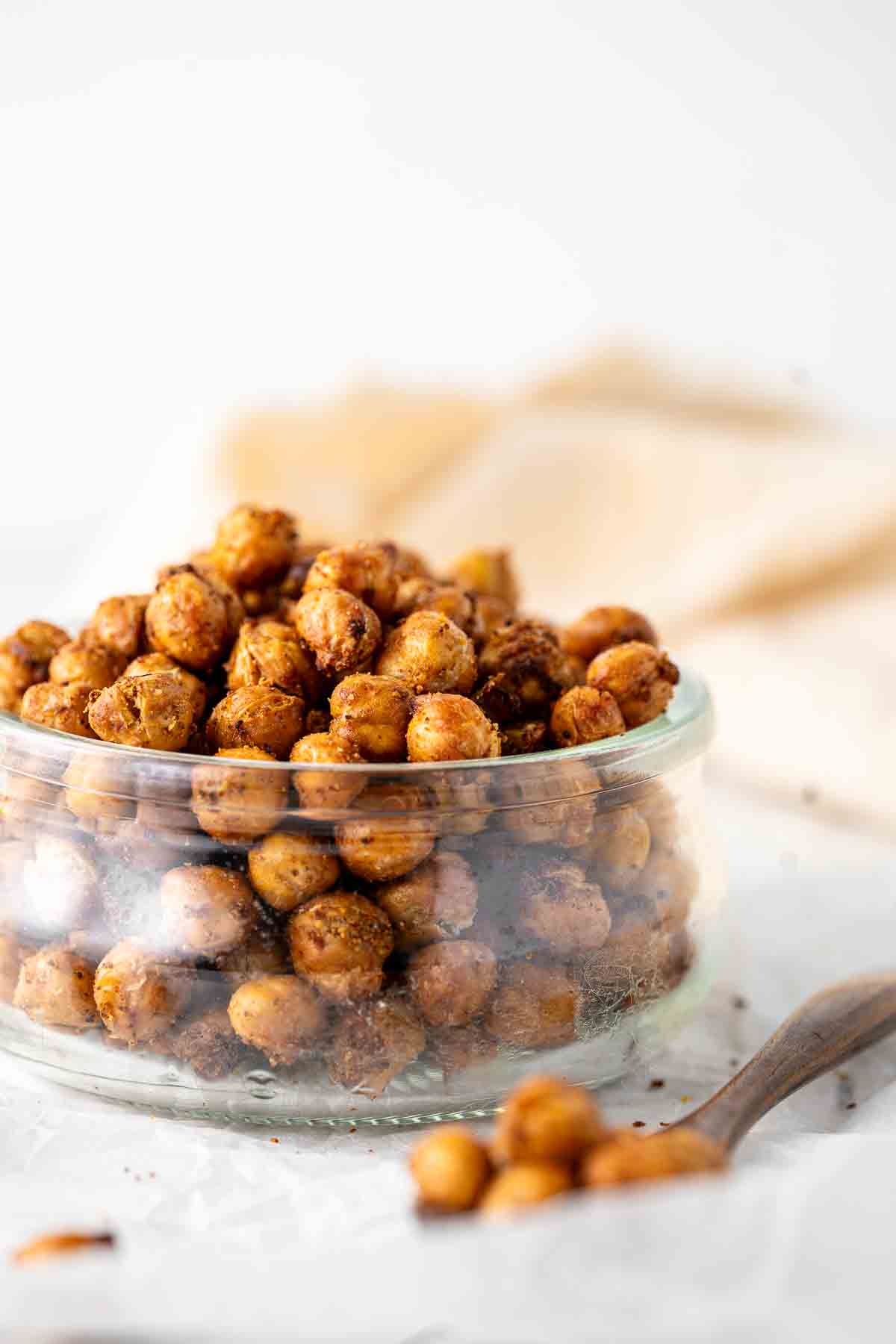 Air fryer crispy chickpeas in a small glass serving bowl.