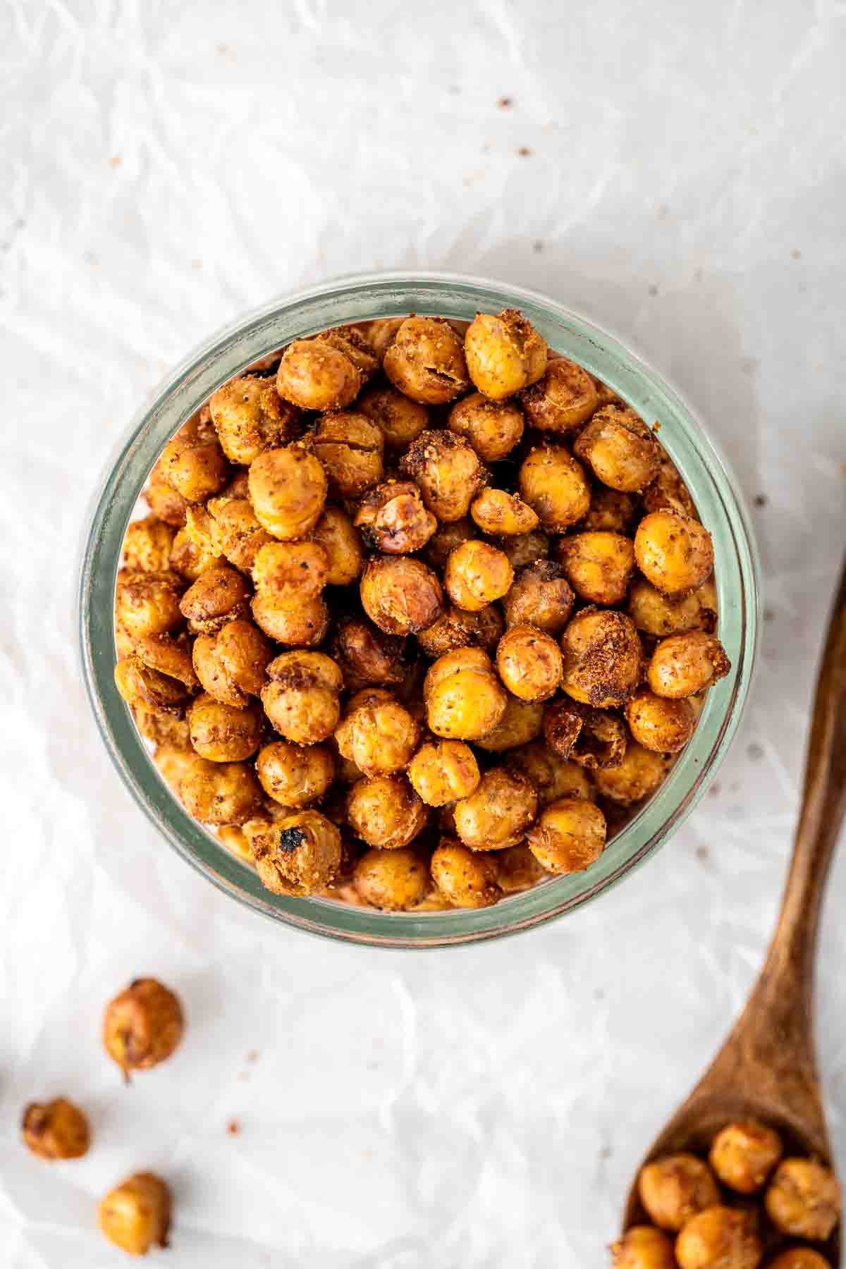 Air fryer crispy chickpeas in a glass bowl from above.