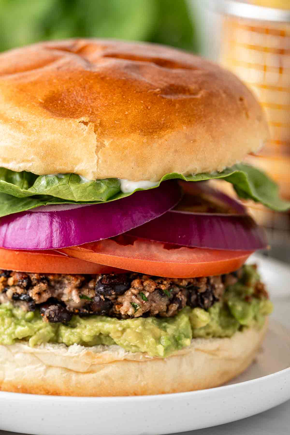 Close up of vegan black bean burger showing the layers.
