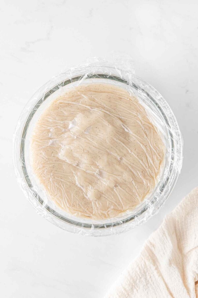 Vegan vanilla custard in a glass bowl.