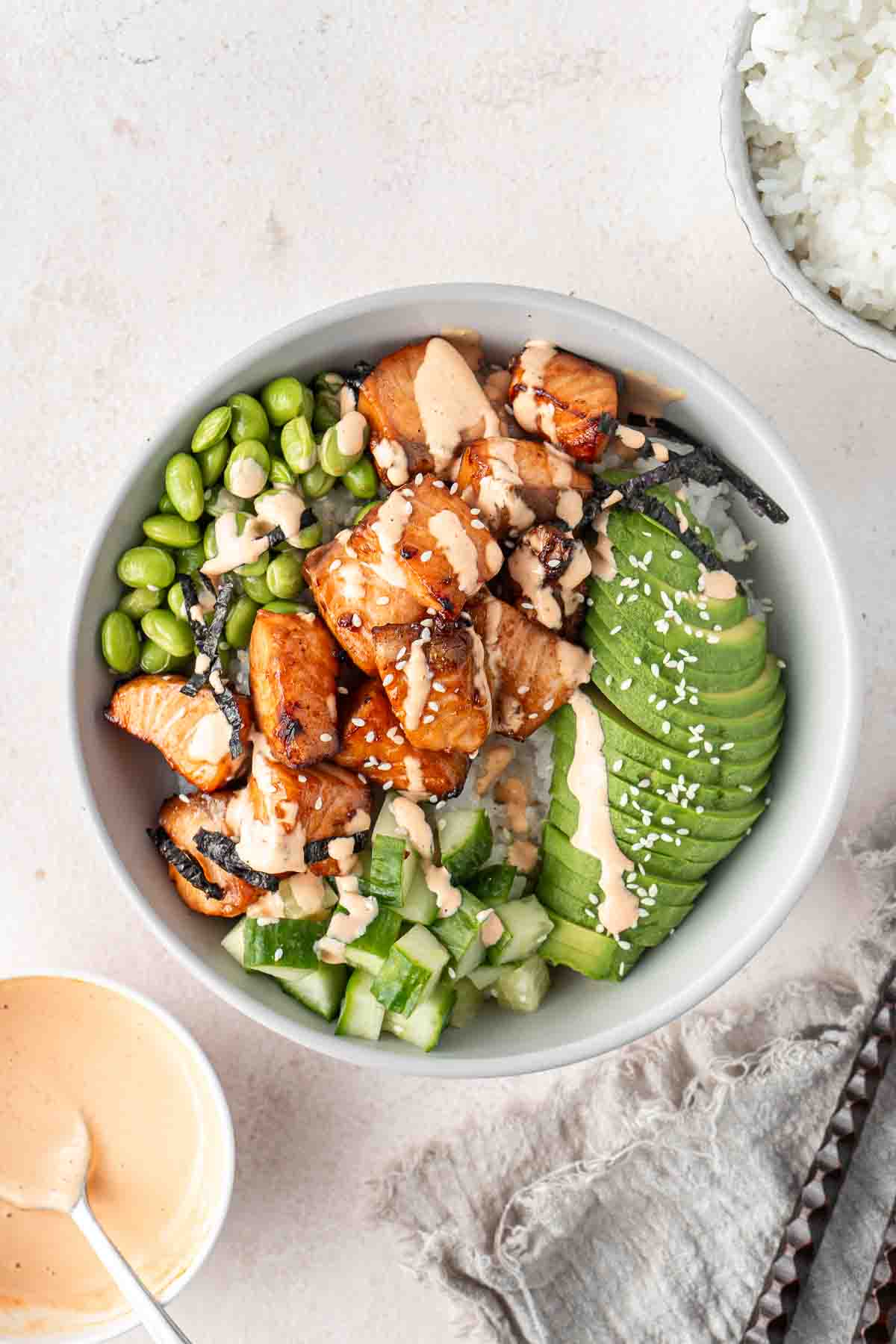 Air fryer salmon bowl with spicy mayo.