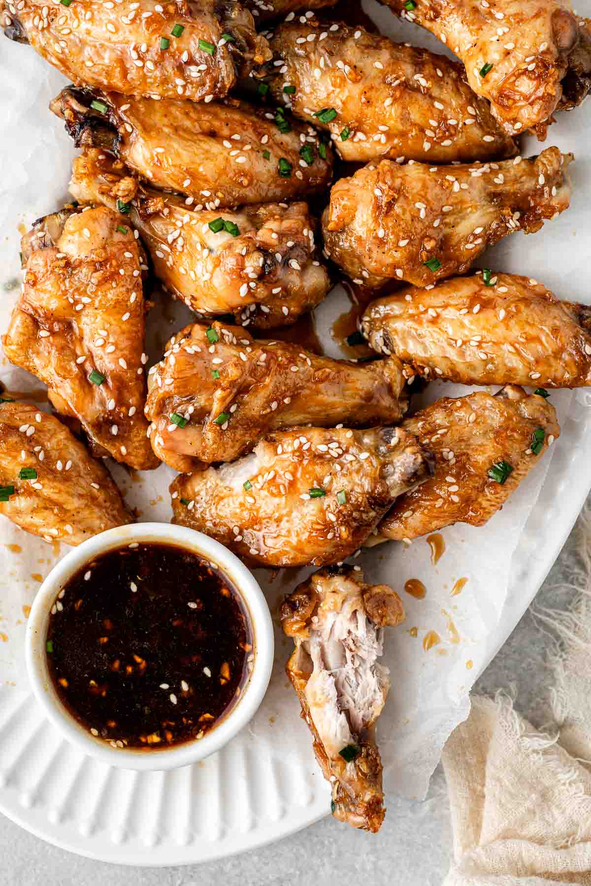 Chicken wings on a serving plate.