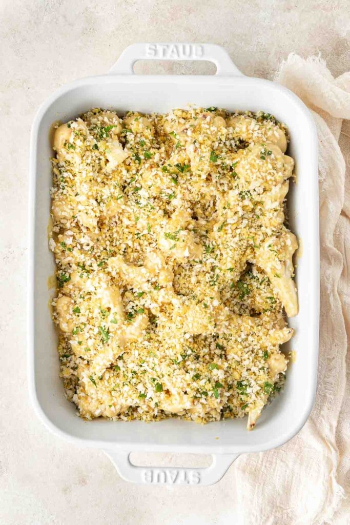 Breadcrumbs spread over the cauliflower ready for the oven.