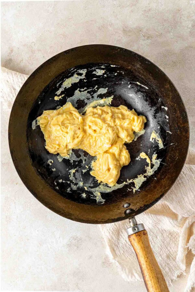Scrambled egg in a wok.