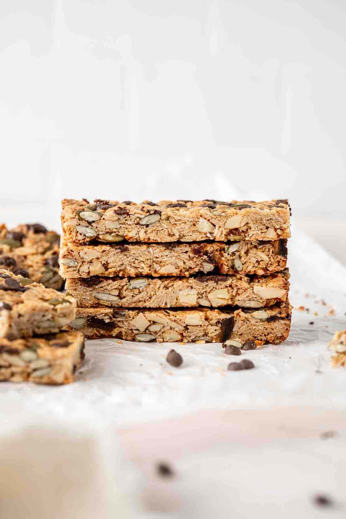 A stack of 4 granola bars with chocolate chips.