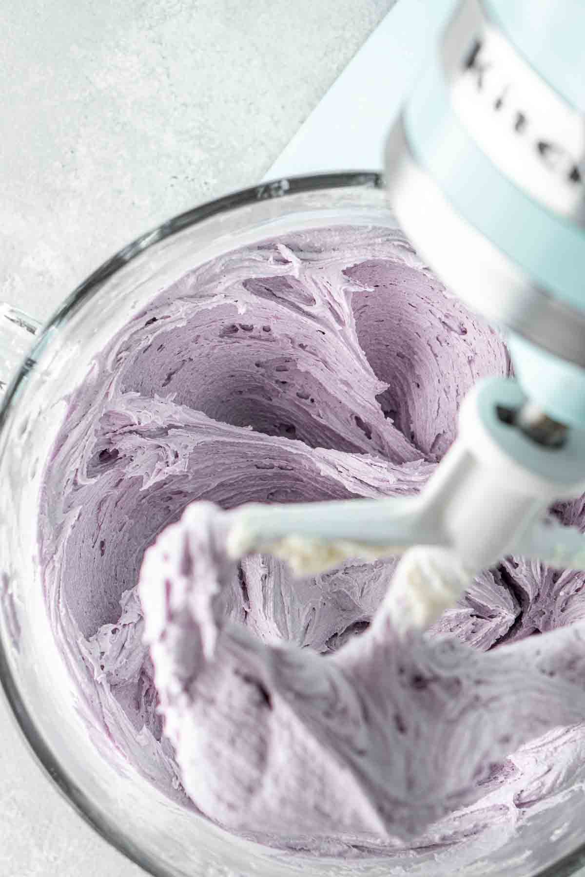 Lavender buttercream in the bowl of the stand mixer.