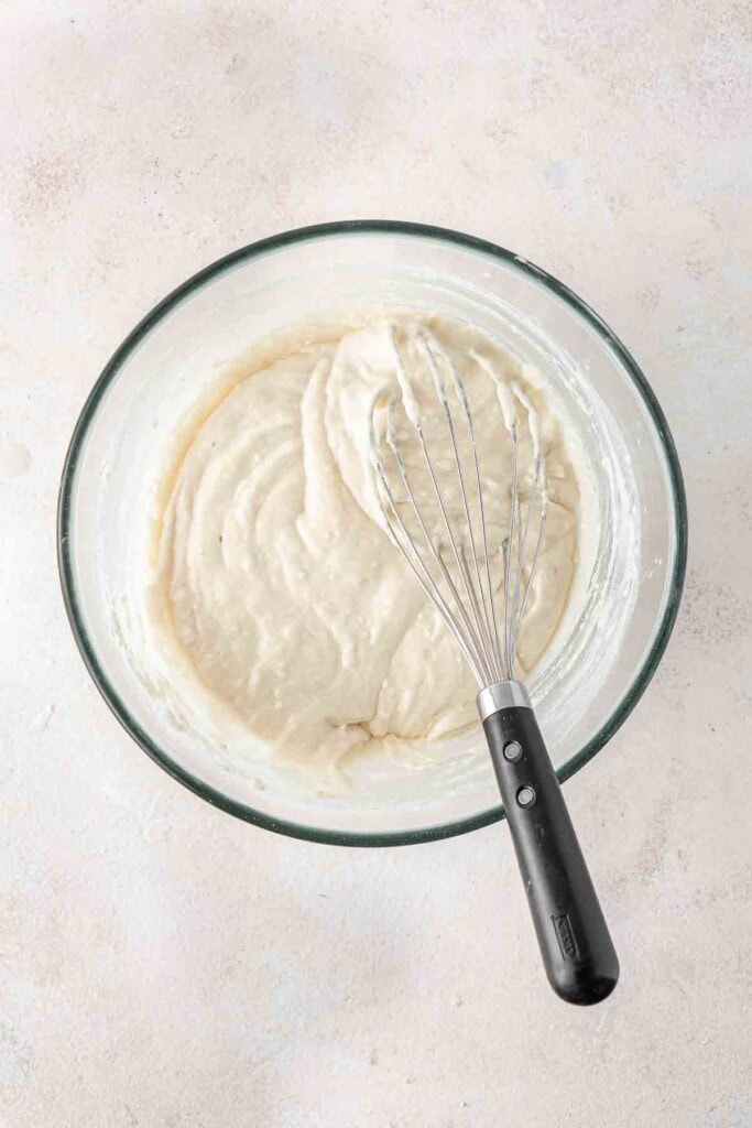 The cake batter mixed together in a large mixing bowl.