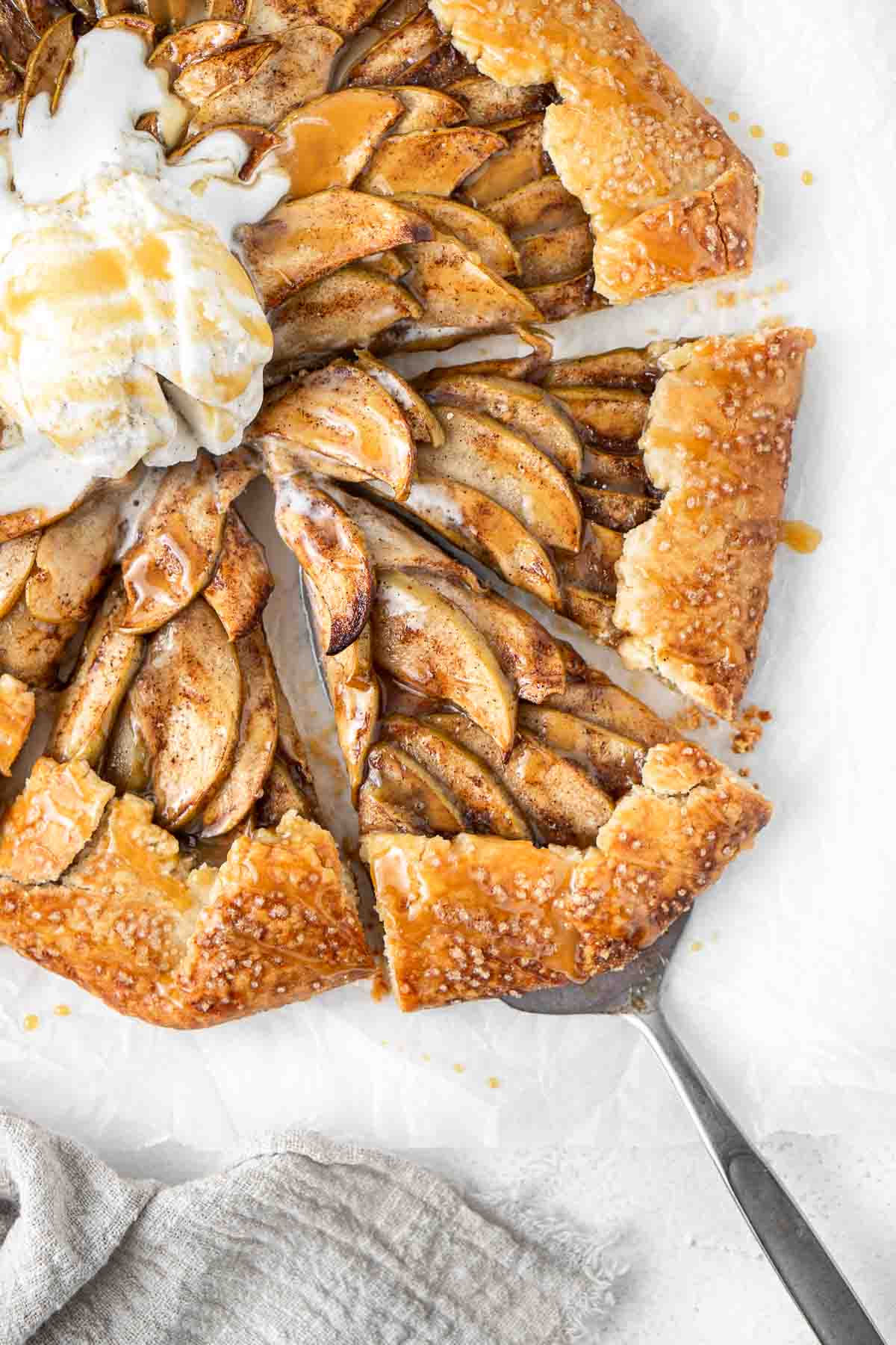 Close up of a slice of caramel apple galette.