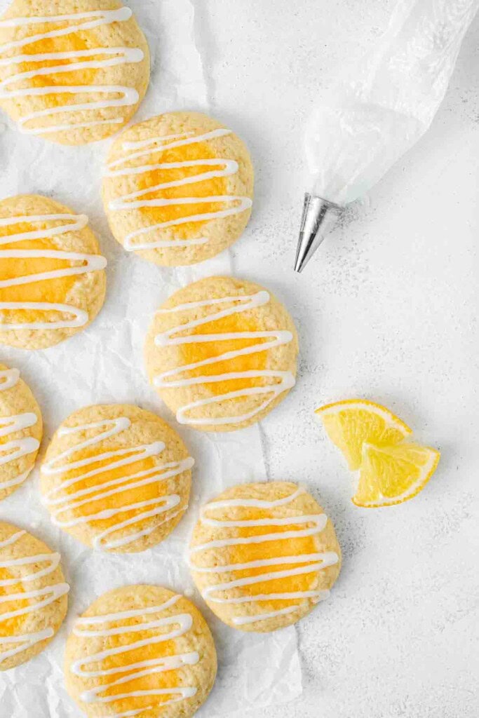 The lemon thumbprint cookies with a lemon glaze and piping bag.
