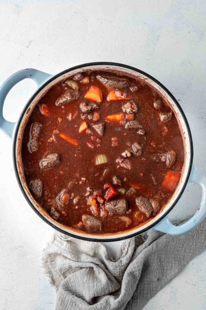 All ingredients in the dutch oven, ready to simmer.