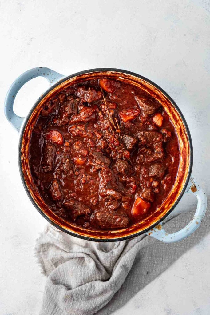 The ragu in the dutch oven after cooking for 2-3 hours.