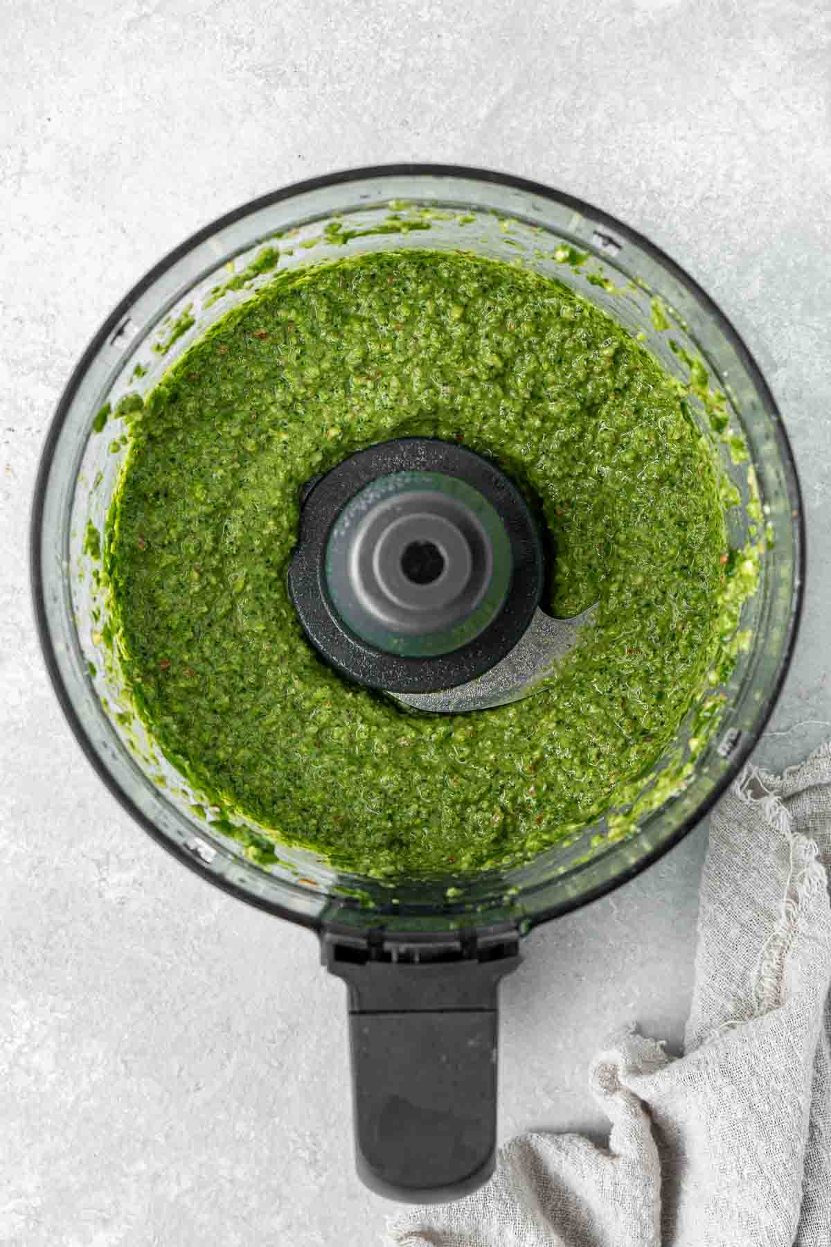 Spinach pesto in a food processor. 