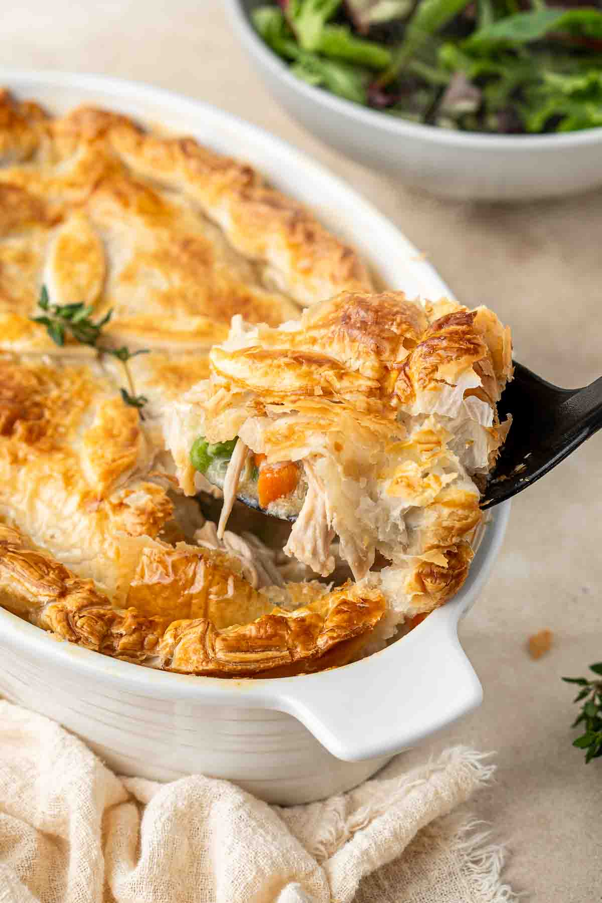 Serving the chicken pot pie.