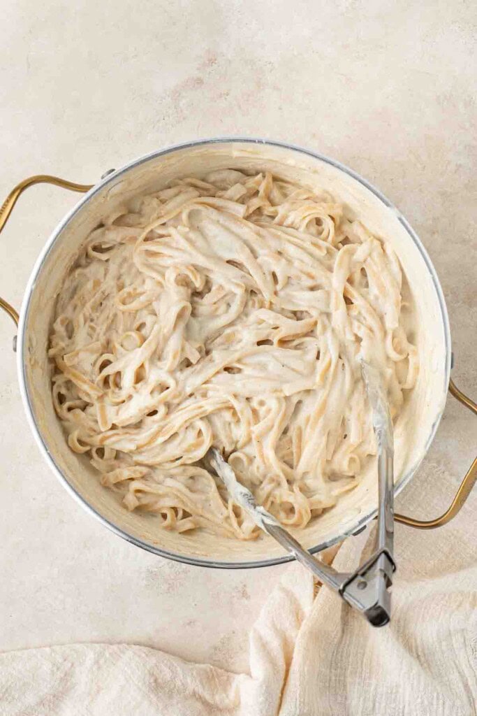 Creamy vegan alfredo in a large pot.