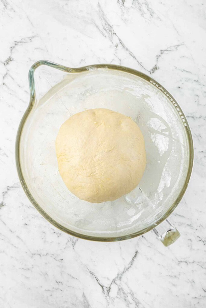 The dough in an oiled bowl ready to rise.