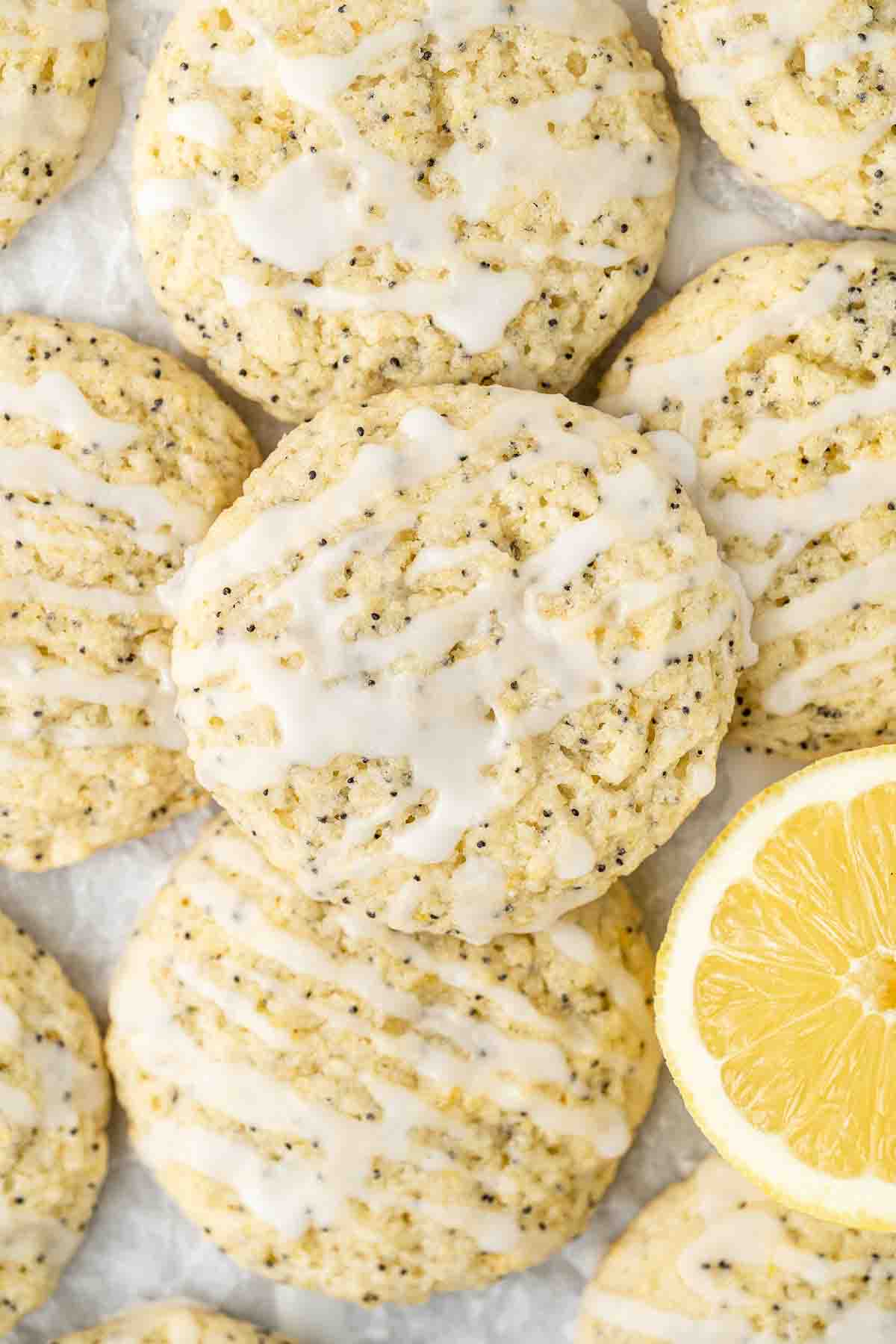 Vegan lemon poppy seed cookies with lemon glaze drizzle.