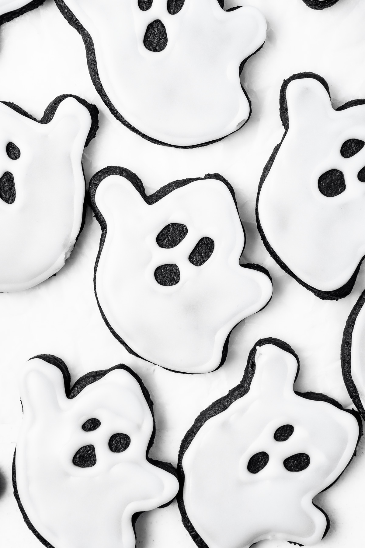 Dairy free black cocoa ghost cookies.