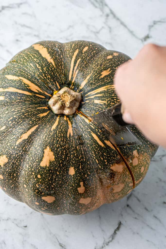 A knife cutting the pumpkin.