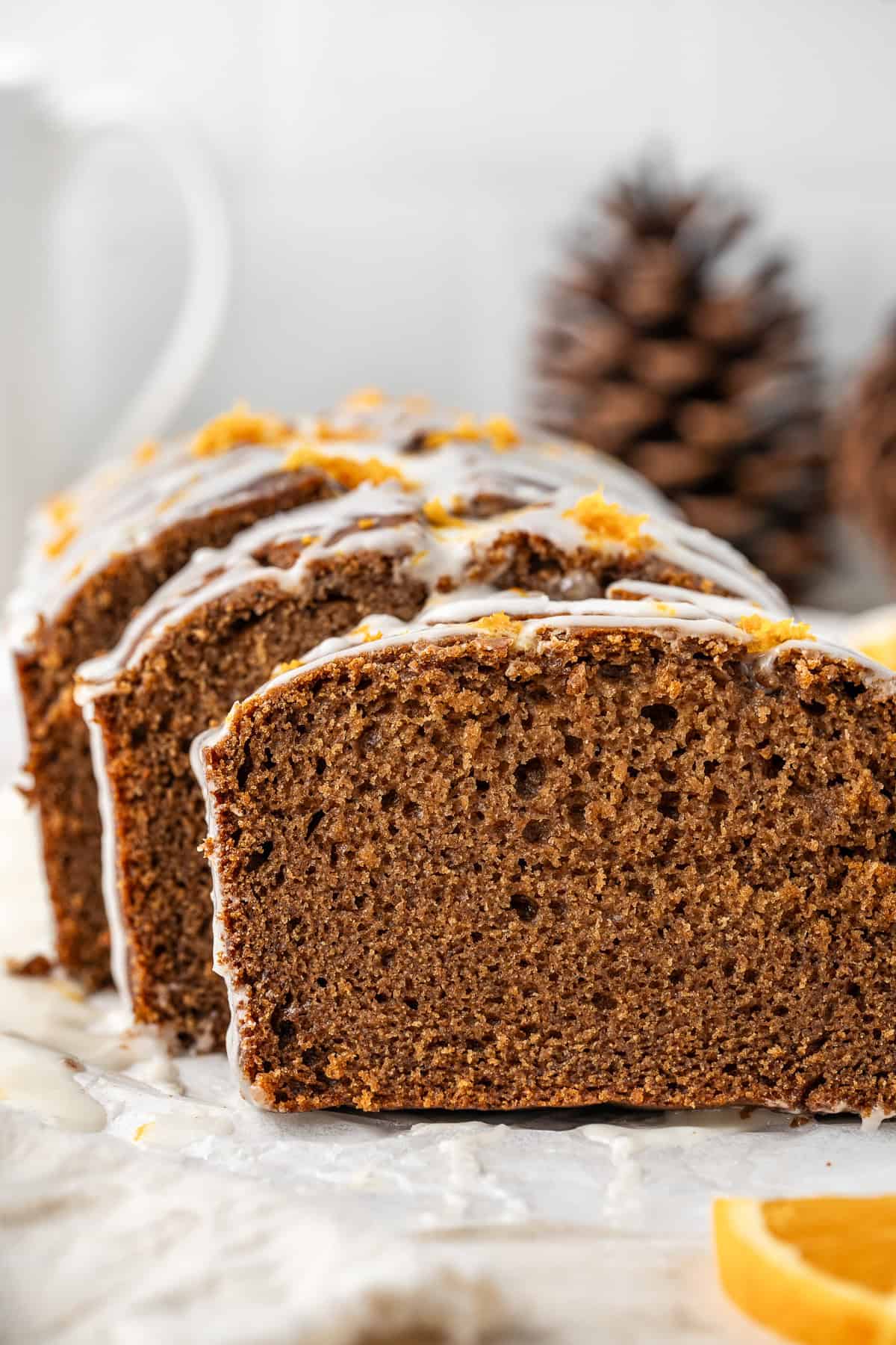 Close up of slices of dairy free gingerbread loaf cake.