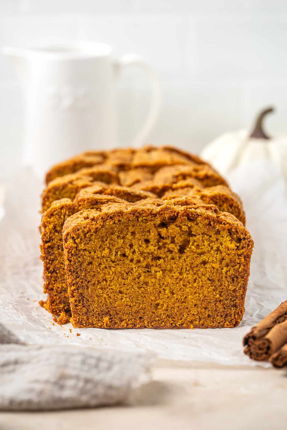 Close up of sliced dairy free pumpkin bread.