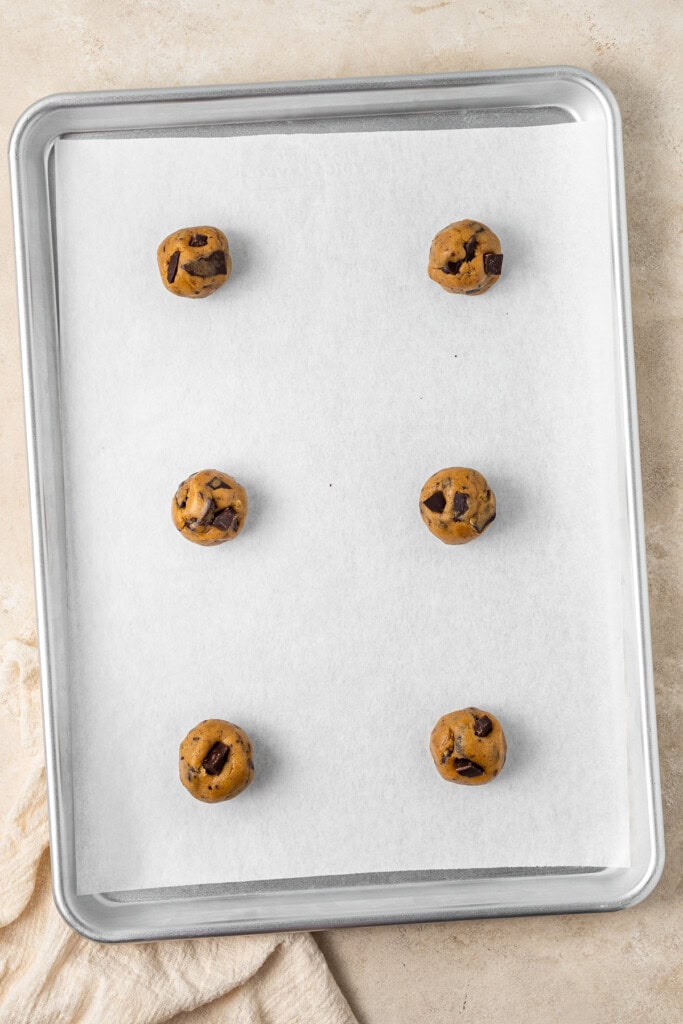 Vegan pumpkin chocolate chip cookie dough on a tray.