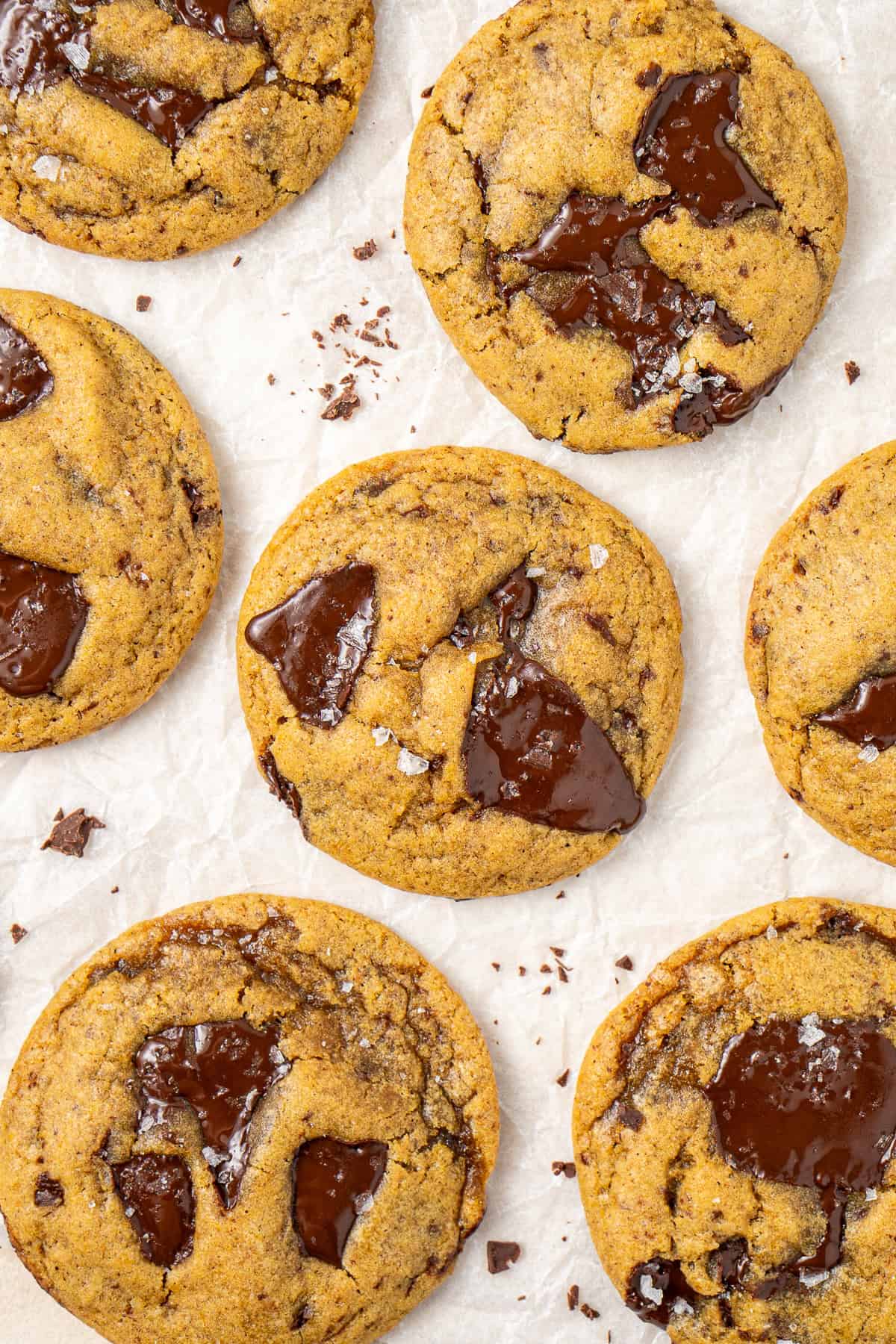 Vegan pumpkin chocolate chip cookies topped with flaky sea salt.