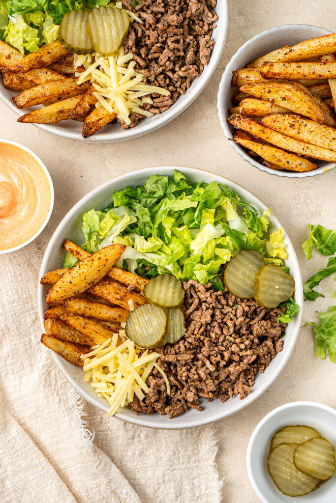 Assembled beef burger bowl.